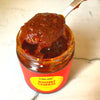 Boomz Sambal belachan shrimp paste chili sauce jar. Spicy bold umami flavor. Close-up of Singaporean sambal chili paste on spoon